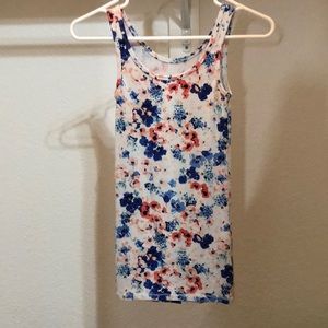 a flowery tank top